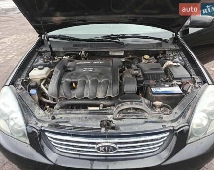 Черный Киа Маджентис, объемом двигателя 2 л и пробегом 322 тыс. км за 5000 $, фото 8 на Automoto.ua