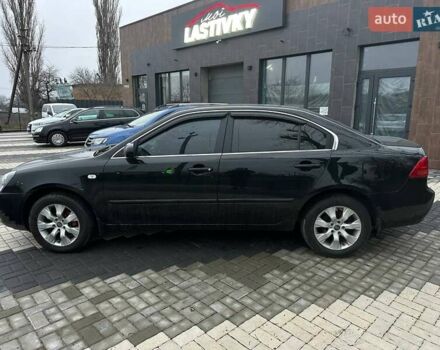 Чорний Кіа Маджентіс, об'ємом двигуна 2 л та пробігом 302 тис. км за 5800 $, фото 9 на Automoto.ua