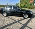 Черный Киа Маджентис, объемом двигателя 2 л и пробегом 188 тыс. км за 6999 $, фото 5 на Automoto.ua