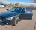 Черный Киа Маджентис, объемом двигателя 2.66 л и пробегом 230 тыс. км за 6000 $, фото 1 на Automoto.ua