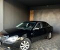 Черный Киа Маджентис, объемом двигателя 2 л и пробегом 170 тыс. км за 5300 $, фото 1 на Automoto.ua