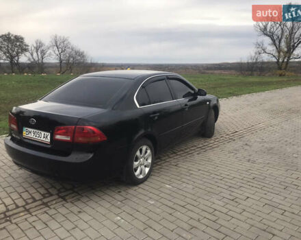 Кіа Маджентіс 2007 у Ромнах на Automoto.ua Чорний Кіа Маджентіс, об'ємом двигуна 2 л та пробігом 231 тис. км за 4900 $, фото 5 на Automoto.ua