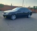 Черный Киа Маджентис, объемом двигателя 2.7 л и пробегом 290 тыс. км за 6020 $, фото 1 на Automoto.ua