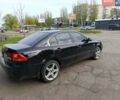 Черный Киа Маджентис, объемом двигателя 2 л и пробегом 380 тыс. км за 4400 $, фото 1 на Automoto.ua