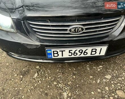 Чорний Кіа Маджентіс, об'ємом двигуна 2.66 л та пробігом 218 тис. км за 4600 $, фото 1 на Automoto.ua