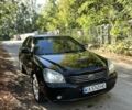 Чорний Кіа Маджентіс, об'ємом двигуна 2 л та пробігом 340 тис. км за 4600 $, фото 1 на Automoto.ua