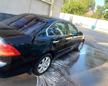 Черный Киа Маджентис, объемом двигателя 2 л и пробегом 180 тыс. км за 4800 $, фото 1 на Automoto.ua