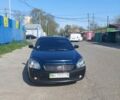 Черный Киа Маджентис, объемом двигателя 2 л и пробегом 320 тыс. км за 4599 $, фото 1 на Automoto.ua