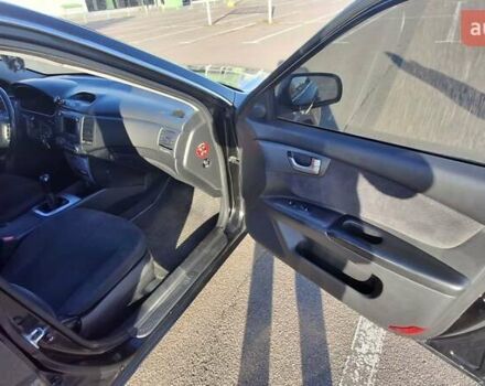 Чорний Кіа Маджентіс, об'ємом двигуна 2 л та пробігом 373 тис. км за 4500 $, фото 12 на Automoto.ua