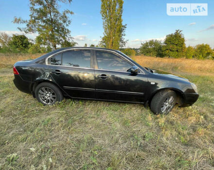 Чорний Кіа Маджентіс, об'ємом двигуна 2 л та пробігом 160 тис. км за 5200 $, фото 5 на Automoto.ua