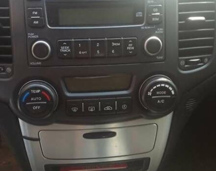 Черный Киа Маджентис, объемом двигателя 2 л и пробегом 322 тыс. км за 5000 $, фото 6 на Automoto.ua