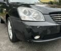 Чорний Кіа Маджентіс, об'ємом двигуна 2 л та пробігом 335 тис. км за 3500 $, фото 6 на Automoto.ua