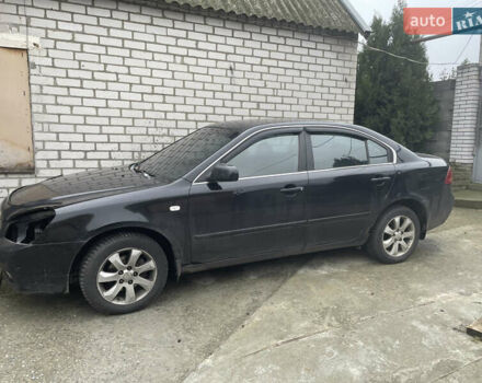 Черный Киа Маджентис, объемом двигателя 2 л и пробегом 366 тыс. км за 4000 $, фото 1 на Automoto.ua