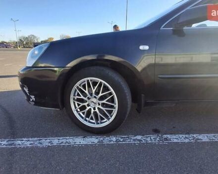 Чорний Кіа Маджентіс, об'ємом двигуна 2 л та пробігом 373 тис. км за 4500 $, фото 11 на Automoto.ua