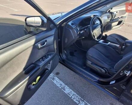 Чорний Кіа Маджентіс, об'ємом двигуна 2 л та пробігом 373 тис. км за 4500 $, фото 8 на Automoto.ua