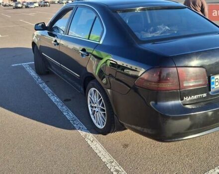 Чорний Кіа Маджентіс, об'ємом двигуна 2 л та пробігом 373 тис. км за 4500 $, фото 4 на Automoto.ua