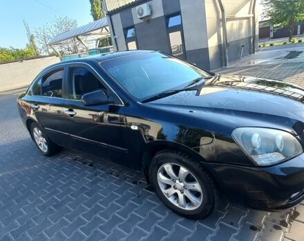 Черный Киа Маджентис, объемом двигателя 2 л и пробегом 180 тыс. км за 4800 $, фото 5 на Automoto.ua