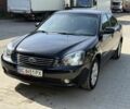 Черный Киа Маджентис, объемом двигателя 2 л и пробегом 267 тыс. км за 5200 $, фото 1 на Automoto.ua