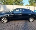 Черный Киа Маджентис, объемом двигателя 2 л и пробегом 180 тыс. км за 4800 $, фото 3 на Automoto.ua