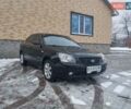 Черный Киа Маджентис, объемом двигателя 2 л и пробегом 363 тыс. км за 4600 $, фото 1 на Automoto.ua