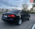 Черный Киа Маджентис, объемом двигателя 2 л и пробегом 230 тыс. км за 4400 $, фото 2 на Automoto.ua