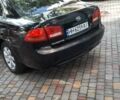 Черный Киа Маджентис, объемом двигателя 2 л и пробегом 214 тыс. км за 6300 $, фото 2 на Automoto.ua