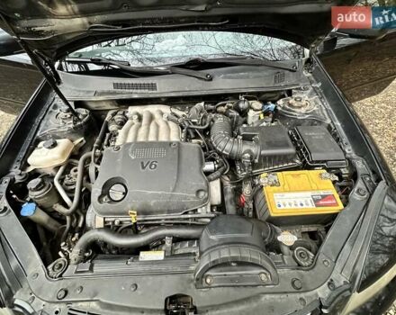 Чорний Кіа Маджентіс, об'ємом двигуна 2.66 л та пробігом 218 тис. км за 4600 $, фото 29 на Automoto.ua