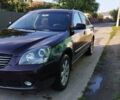 Черный Киа Маджентис, объемом двигателя 2 л и пробегом 180 тыс. км за 4850 $, фото 8 на Automoto.ua