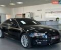 Черный Киа Маджентис, объемом двигателя 2 л и пробегом 100 тыс. км за 6600 $, фото 1 на Automoto.ua