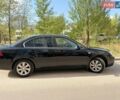 Чорний Кіа Маджентіс, об'ємом двигуна 2 л та пробігом 280 тис. км за 5300 $, фото 1 на Automoto.ua