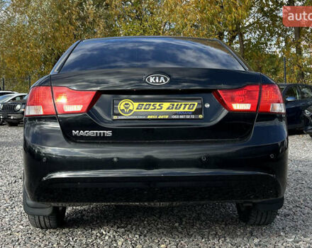 Чорний Кіа Маджентіс, об'ємом двигуна 2 л та пробігом 174 тис. км за 4800 $, фото 4 на Automoto.ua