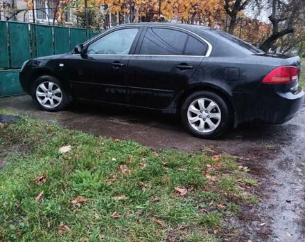 Чорний Кіа Маджентіс, об'ємом двигуна 2 л та пробігом 100 тис. км за 4800 $, фото 6 на Automoto.ua