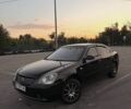 Чорний Кіа Маджентіс, об'ємом двигуна 2 л та пробігом 297 тис. км за 4590 $, фото 1 на Automoto.ua