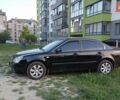 Черный Киа Маджентис, объемом двигателя 2 л и пробегом 220 тыс. км за 5800 $, фото 1 на Automoto.ua
