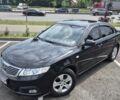 Черный Киа Маджентис, объемом двигателя 2 л и пробегом 250 тыс. км за 6200 $, фото 1 на Automoto.ua