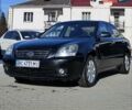 Черный Киа Маджентис, объемом двигателя 2 л и пробегом 260 тыс. км за 6000 $, фото 2 на Automoto.ua