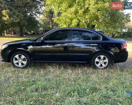 Чорний Кіа Маджентіс, об'ємом двигуна 2 л та пробігом 227 тис. км за 5650 $, фото 3 на Automoto.ua