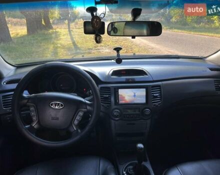 Чорний Кіа Маджентіс, об'ємом двигуна 2 л та пробігом 227 тис. км за 5650 $, фото 12 на Automoto.ua