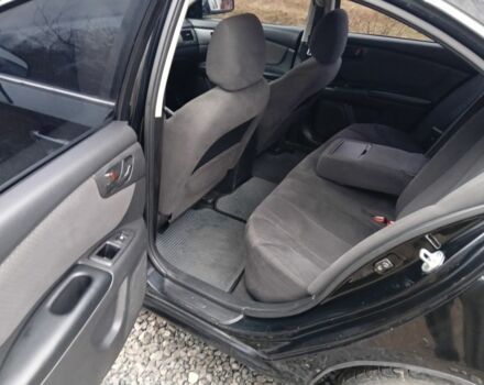 Чорний Кіа Маджентіс, об'ємом двигуна 2 л та пробігом 212 тис. км за 4950 $, фото 10 на Automoto.ua