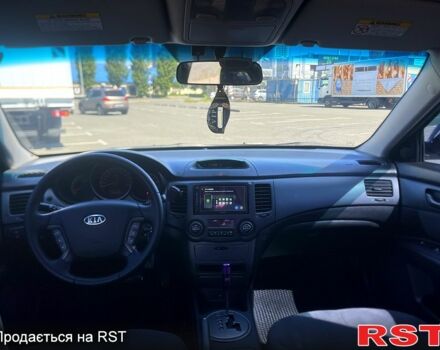 Черный Киа Маджентис, объемом двигателя 2 л и пробегом 260 тыс. км за 4999 $, фото 2 на Automoto.ua