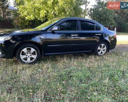 Чорний Кіа Маджентіс, об'ємом двигуна 2 л та пробігом 227 тис. км за 5650 $, фото 5 на Automoto.ua