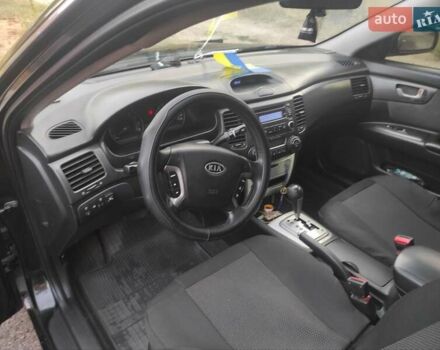 Черный Киа Маджентис, объемом двигателя 2 л и пробегом 228 тыс. км за 5500 $, фото 1 на Automoto.ua