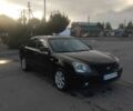 Чорний Кіа Маджентіс, об'ємом двигуна 2 л та пробігом 313 тис. км за 4494 $, фото 1 на Automoto.ua