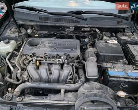 Черный Киа Маджентис, объемом двигателя 2 л и пробегом 208 тыс. км за 6400 $, фото 37 на Automoto.ua