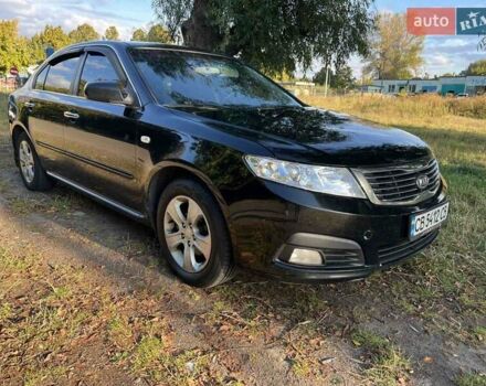 Чорний Кіа Маджентіс, об'ємом двигуна 2 л та пробігом 227 тис. км за 5650 $, фото 1 на Automoto.ua