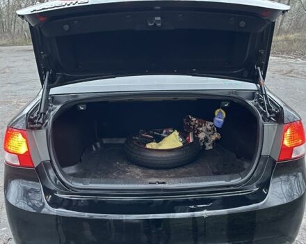 Черный Киа Маджентис, объемом двигателя 2 л и пробегом 222 тыс. км за 7200 $, фото 6 на Automoto.ua