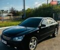 Черный Киа Маджентис, объемом двигателя 2 л и пробегом 225 тыс. км за 5500 $, фото 1 на Automoto.ua