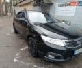 Чорний Кіа Маджентіс, об'ємом двигуна 2 л та пробігом 167 тис. км за 6100 $, фото 1 на Automoto.ua