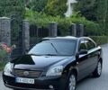 Черный Киа Маджентис, объемом двигателя 2 л и пробегом 235 тыс. км за 6000 $, фото 1 на Automoto.ua