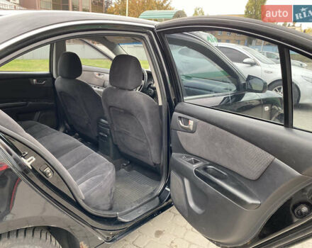 Черный Киа Маджентис, объемом двигателя 2 л и пробегом 239 тыс. км за 5200 $, фото 8 на Automoto.ua